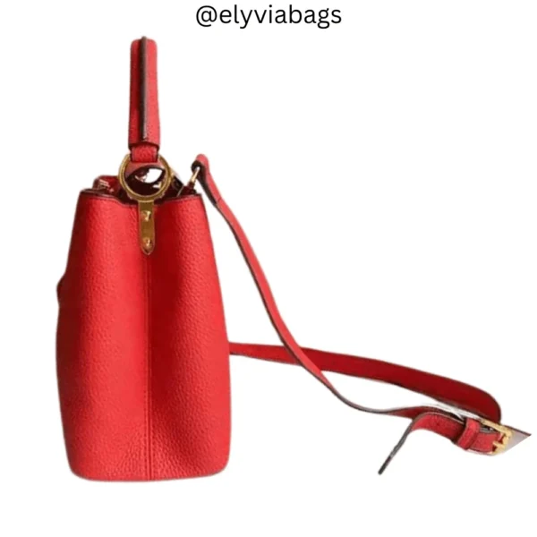 LV Capucines MM Handbag red side view
