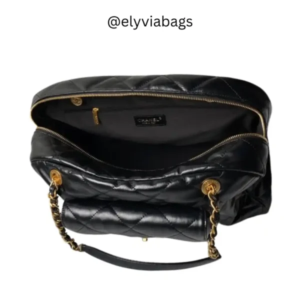 Chanel 24 A maxi bowling black bag inside view
