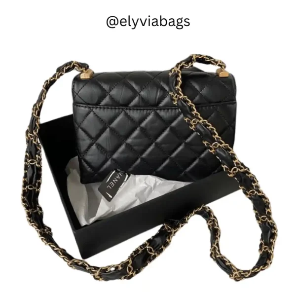 Chanel mini flap black bag back view