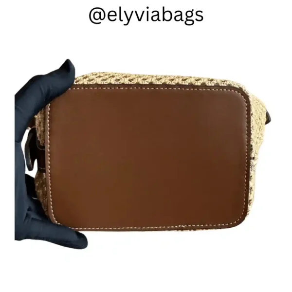 LV All in BB Bag in Raffia bottom side view